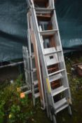 FIVE VARIOUS LADDERS, to include a workzone multi function ladder, two aluminium step ladders, a