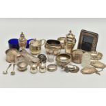 AN ASSORTED BOX OF SILVER ITEMS, to include three napkin rings, salt and pepper shakers, three