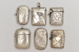 SIX SILVER VESTA CASES, five with engraved floral or foliage patterns, and an embossed floral vesta,