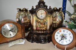 A VICTORIAN PORCELAIN CLOCK GARNITURE, comprising a brown gilt porcelain mantel clock and a brown