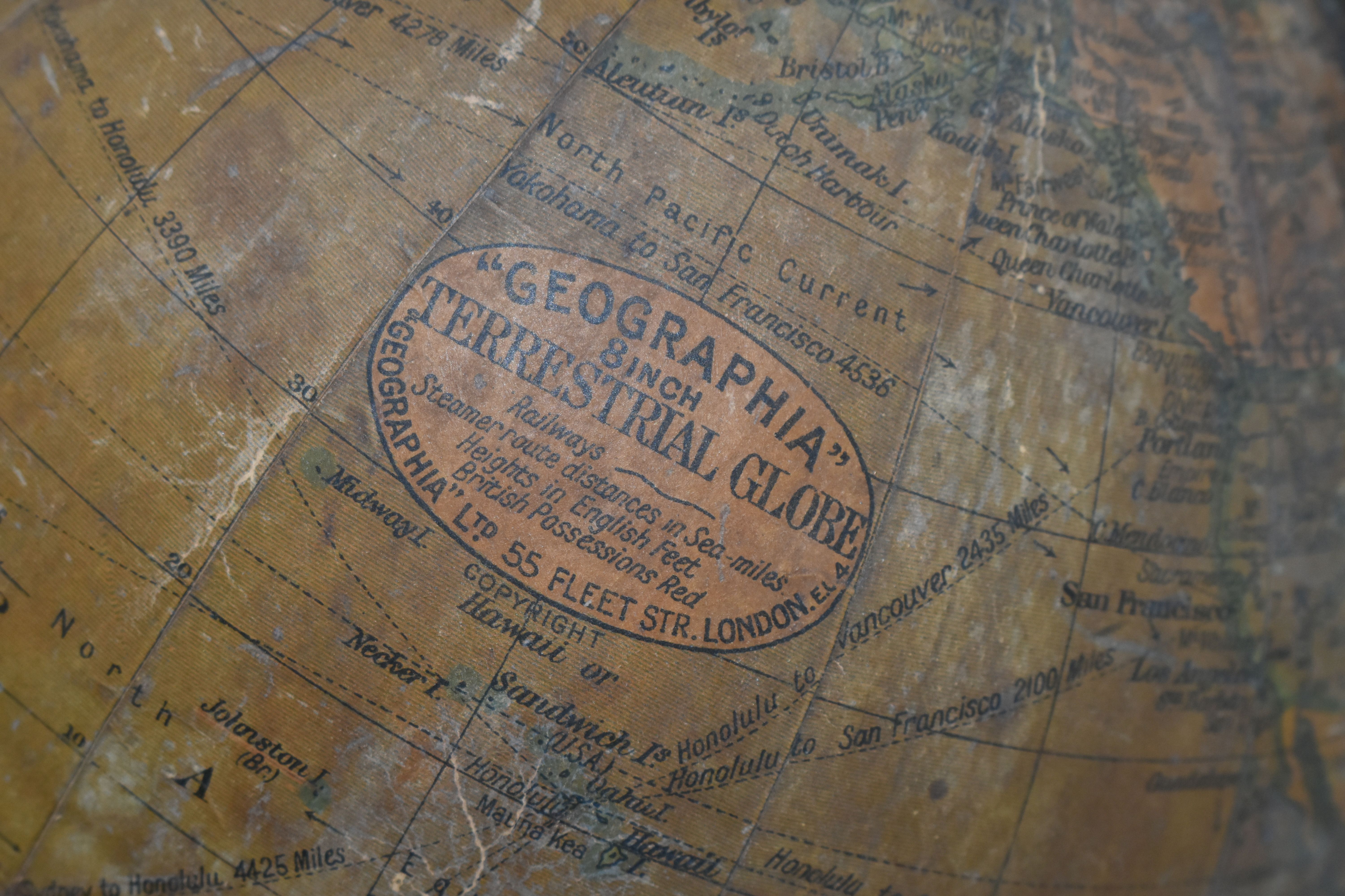 A SMALL 'GEOGRAPHIA' DESK TOP GLOBE, 8 inch terrestrial globe, on an ebonised wooden stand, height - Image 7 of 7