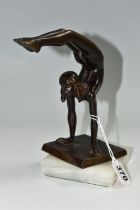 AN ART DECO STYLE BRONZE FIGURE OF A NUDE FEMALE ACROBAT AFTER CARL JOHAN BONNESEN, marked to the