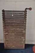 A VINTAGE CAST IRON RADIATOR, length 138cm x height 84cm (condition: in need of a clean, very
