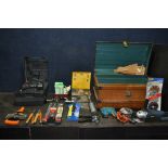 A VINTAGE METAL TRAVELING TRUNK CONTAINING A SELECTION OF TOOLS, to include a power craft AGM6010