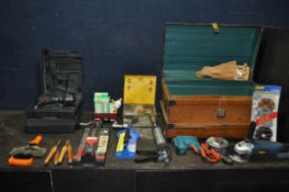 A VINTAGE METAL TRAVELING TRUNK CONTAINING A SELECTION OF TOOLS, to include a power craft AGM6010