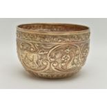 A MID 20TH CENTURY SILVER EMBOSSED BOWL, embossed floral and foliage pattern with vacant