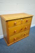 A VICTORIAN PINE CHEST OF TWO SHORT OVER TWO LONG DRAWERS, width 107cm x depth 54cm x height 96cm (