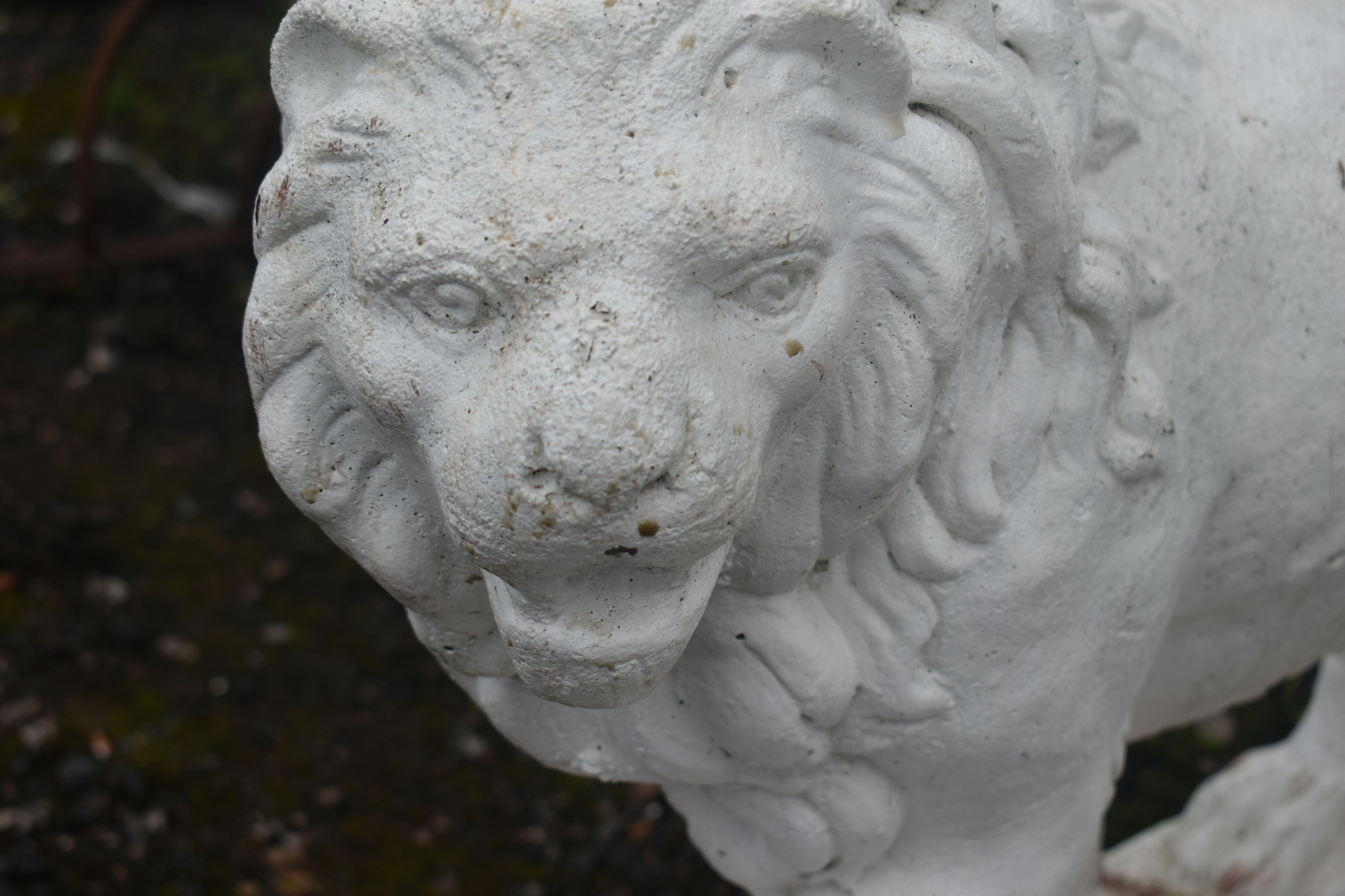 AN OPPOSING PAIR OF WHITE PAINTED COMPOSITE LIONS, with turned heads, and one front foot raised, - Image 3 of 6