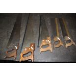 A WINGFIELD AND ROWBOTHAM CO SAW, with a 14 inch blade, another saw with a 14 inch blade, and