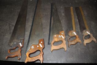 A WINGFIELD AND ROWBOTHAM CO SAW, with a 14 inch blade, another saw with a 14 inch blade, and