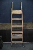 A VINTAGE WOODEN STEP LADDER with a cast iron hinge height 175cm