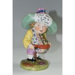 A 19TH CENTURY DERBY MANSION HOUSE DWARF, his broad brimmed hat entitled 'A small farm to be sold by