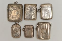 SIX EDWARDIAN AND GEORGE V SILVER RECTANGULAR VESTA CASES, two engine turned and four foliate