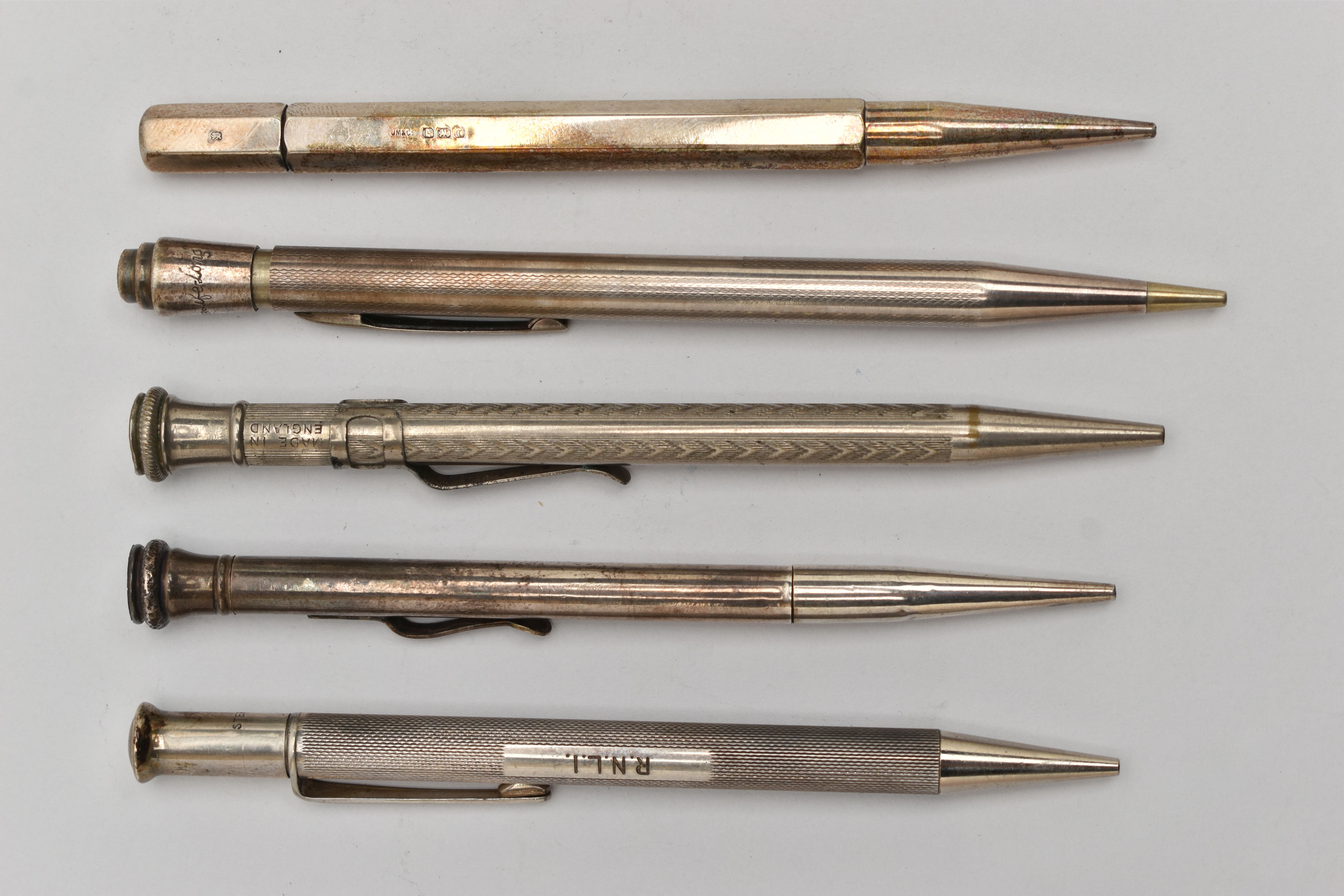 FIVE PROPELLING PENCILS, to include a silver hexagonal pencil, hallmarked 'Johnson, Matthey & Co' - Image 2 of 2