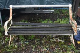 A DISTRESSED GARDEN BENCH, with wooden slats and cast iron ends, length 160cm (condition report: