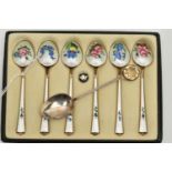 A BOXED SET OF SIX NORWEGIAN SILVER GILT AND ENAMEL COFFEE SPOONS, the back of each bowl and