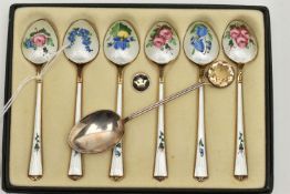 A BOXED SET OF SIX NORWEGIAN SILVER GILT AND ENAMEL COFFEE SPOONS, the back of each bowl and