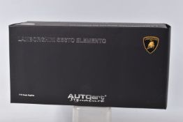 A BOXED AUTOART MODELS LAMBORGHINI SESTO ELEMENTO MODEL VEHICLE SCALE 1:18, numbered 74671,