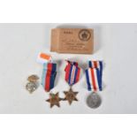 THREE BOXED WWII MEDALS AND A CAP BADGE, the medals are 1939-1945 Star and Medal and a France and