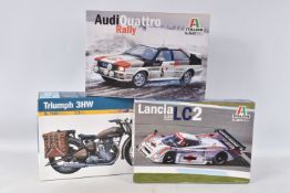 THREE BOXED UNBUILT ITALERI MODEL KITS, to include a Lancia LC2, 1:24 scale, no. 3641, a Triumph