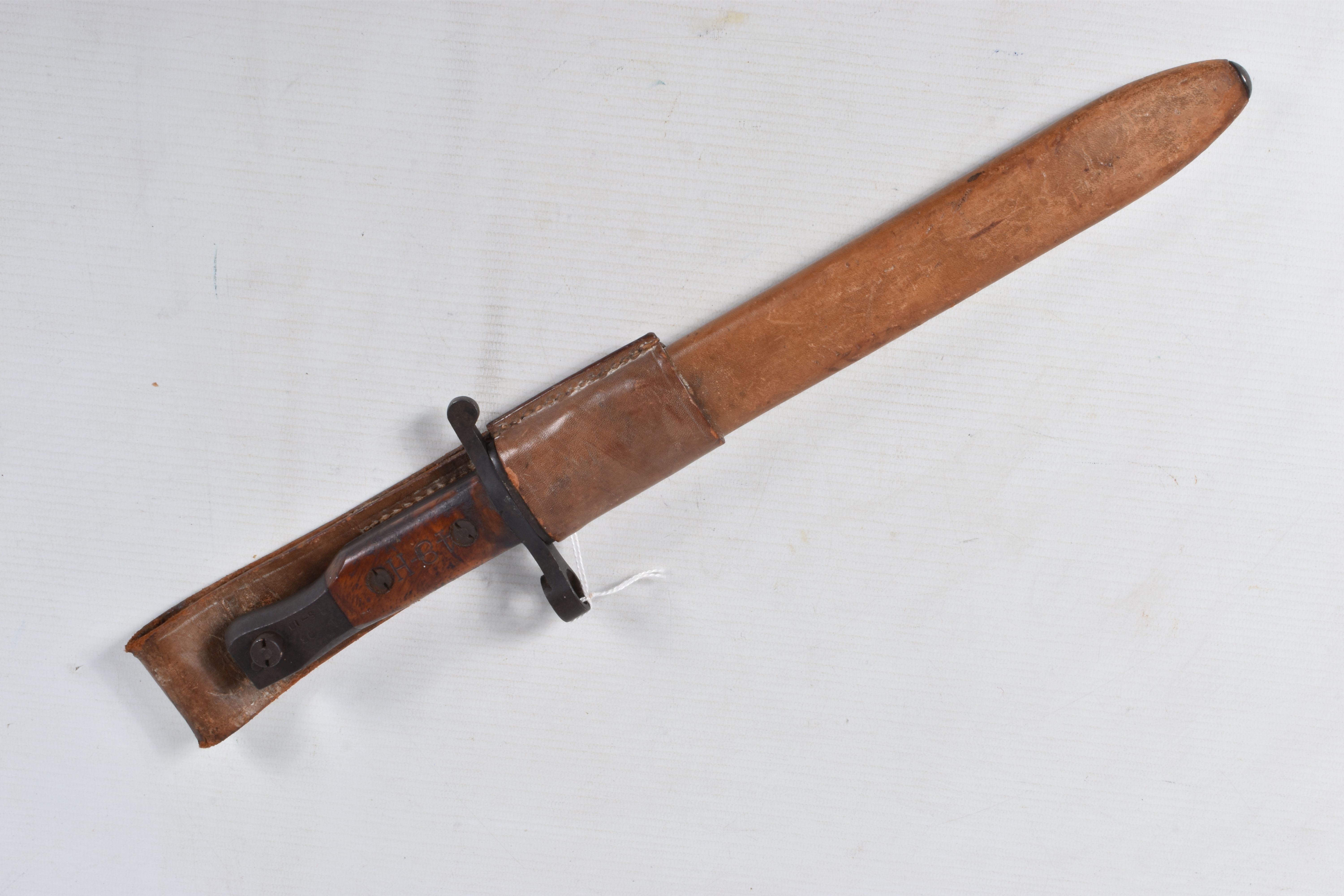 A 1907 PATTERN CANADIAN ROSS RIFLE BAYONET, the blade us unmarked but the handle has 48-H on one