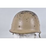 AN IRAQI M80 HELMET WITH LINER, these helmets were overpainted for camouflage and like the