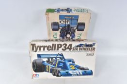 TWO BOXED UNBUILT TAMIYA MODEL RACECARS, to include a Tyrell P34 Six Wheeler 1:12 scale series no.