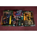 A QUANTITY OF UNBOXED AND ASSORTED PLAYWORN DIECAST VEHICLES, to include three Unimax Tanks, all