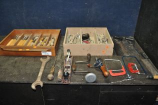 TWO TRAYS CONTAINING VARIOUS TOOLS, to include spanners, saws, a quantity of wood working chisels, a