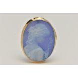 A YELLOW METAL CAMEO PENDANT, carved agate, depicting a lady in profile holding flowers, collet