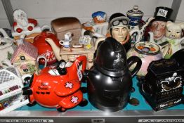 NINETEEN NOVELTY AND DECORATIVE TEAPOTS, to include a Carlton Ware 'Red Baron' teapot and another