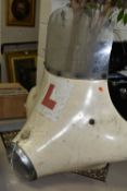 A 1950'S/1960'S MOTORCYCLE FAIRING, of fibreglass construction with windscreen and Lucas headlamp