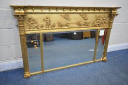 A REGENCY GILT WOOD TRIPLE PLATE BEVELED EDGE OVERMANTEL MIRROR, depicting a lion drawn carriage,