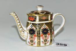 A ROYAL CROWN DERBY IMARI MINIATURE TEA POT AND COVER, in the 1128 pattern, printed and painted
