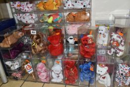 A COLLECTION OF FORTY TWO TY BEANIE BABY ANIMALS, in perspex storage display cases, to include