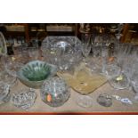A GROUP OF CUT CRYSTAL, comprising three Dartington Crystal wine glasses, an apricot coloured Murano
