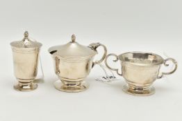 A GEORGE VI SILVER THREE PIECE CRUET SET, of circular form with engraved band of three wavy lines,