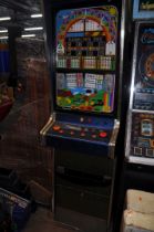 AN ACE COIN EQUIPMENT VINTAGE SLOT MACHINE with 'Rainbows End' graphics and mechanism, width 53cm