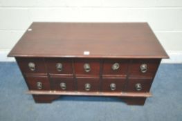 A MODERN MAHOGANY COFFEE TABLE, with ten drawers on each side, length 100cm x depth 50cm x height