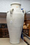 A LARGE TUNISIAN CLAY AMPHORA/URN, rustic handmade with four handles, height 74cm (1) (Condition