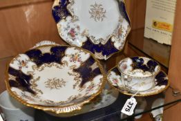 TWO COALPORT DISHES, together with a cup and saucer, cobalt blue panels, Y2665 pattern inside cup,