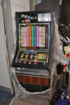 AN AINSWORTH SLOT MACHINE with 'Aristocrat Classic Magic Touch' graphics and mechanism (untested and