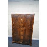 A 20TH CENTURY FLAME MAHOGANY DOUBLE DOOR WARDROBE, with four shelves inside, width 123cm x depth
