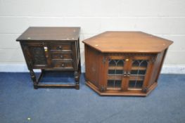 A 20TH CENTURY OAK SIDE TABLE, with three drawers and single cupboard door, width 65cm x depth