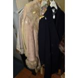 A GROUP OF EIGHT LADIES WINTER COATS, to include a navy blue Laura Ashley woollen over coat, four
