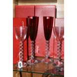 TWO PAIRS OF BOXED BACCARAT RHINE GLASSES, comprising two ruby coloured Baccarat Vega Flutissimo