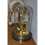 TWO CLOCKS, comprising a white marble cased mantel clock with brocot escapement, two gilt metal