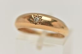 AN 18CT GOLD SINGLE STONE DIAMOND RING, old cut diamond, prong set in a star setting, yellow gold