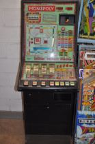 A MAYGAY FRUIT MACHINE with 'Monopoly' graphics and mechanism, height 182cm (untested and may be