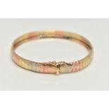 AN ITALIAN TRI COLOUR BRACELET, articulated rose, white and yellow metal bracelet with textured